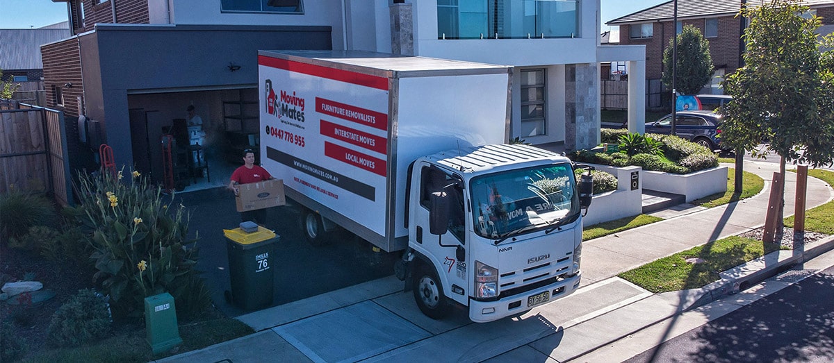 Moving Mates Removalists - Mover Loading Removalist Truck