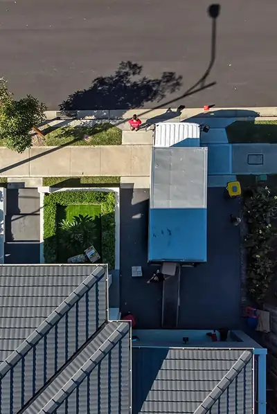 Aerial View of Moving Mates Removalist Truck Parked in Customers Driveway